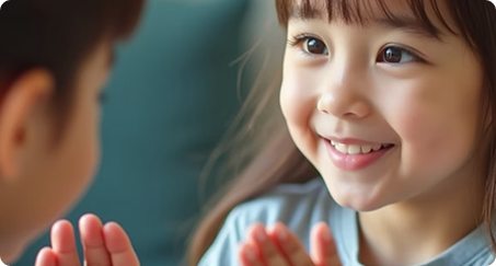 Children playing patty cake